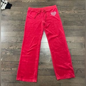 Red low rise flare sweatpants with rhinestone heart